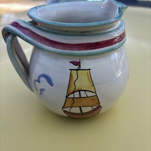 Vintage Italian hand-painted ceramic pitcher featuring sailboats and waves Fish